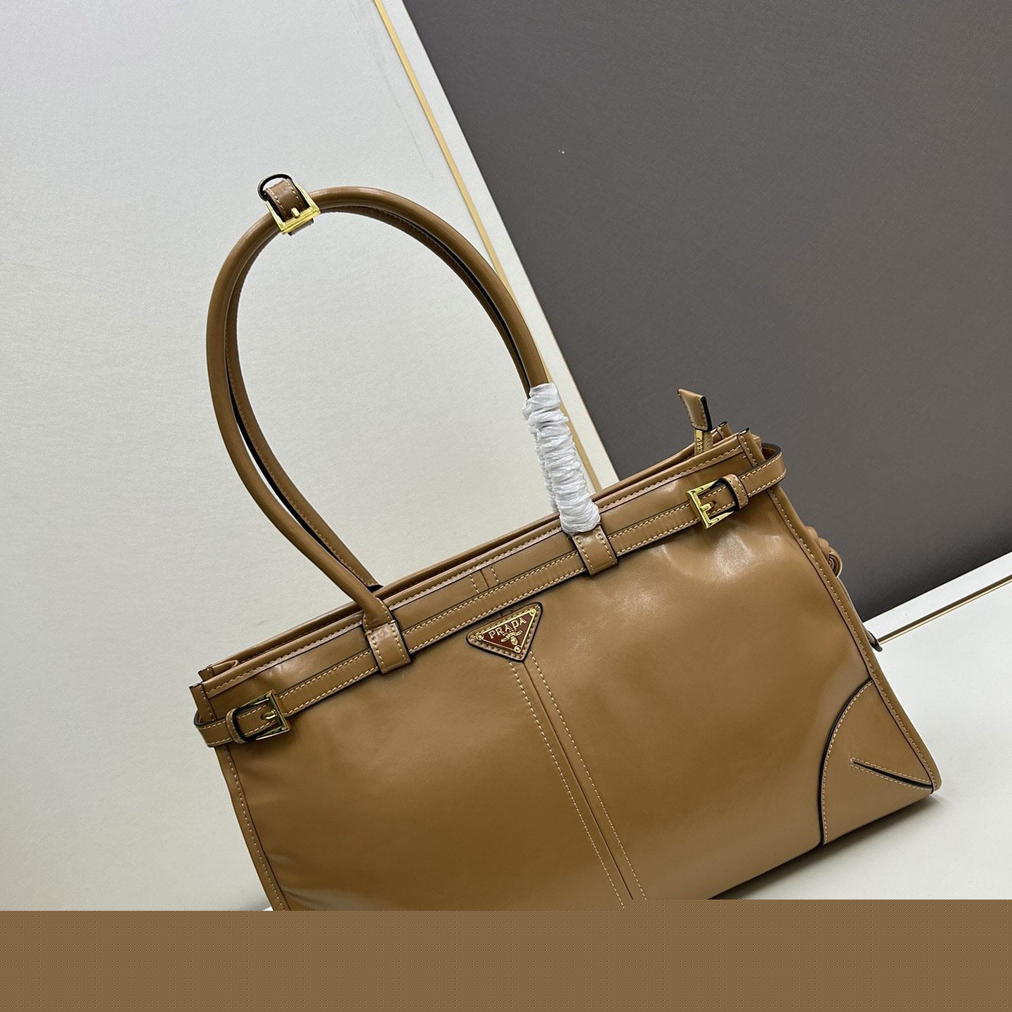 Pra*a top handle bags